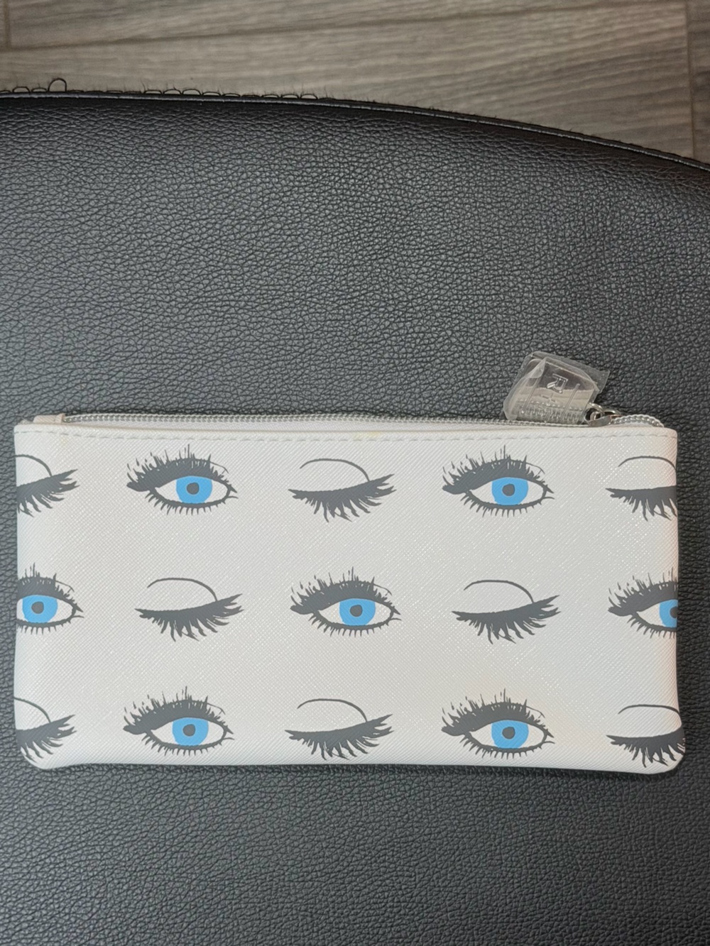 Rodan + Fields White Cosmetic Zip Pouch with Blue Eye Print